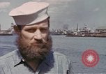 Image of US submarine crews and Japanese POWs disembarking Pearl Harbor Hawaii USA, 1944, second 16 stock footage video 65675076128