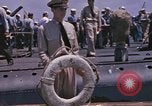 Image of US submarine crews and Japanese POWs disembarking Pearl Harbor Hawaii USA, 1944, second 18 stock footage video 65675076128