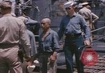 Image of US submarine crews and Japanese POWs disembarking Pearl Harbor Hawaii USA, 1944, second 25 stock footage video 65675076128