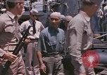 Image of US submarine crews and Japanese POWs disembarking Pearl Harbor Hawaii USA, 1944, second 28 stock footage video 65675076128