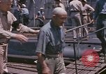 Image of US submarine crews and Japanese POWs disembarking Pearl Harbor Hawaii USA, 1944, second 30 stock footage video 65675076128