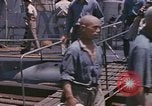 Image of US submarine crews and Japanese POWs disembarking Pearl Harbor Hawaii USA, 1944, second 31 stock footage video 65675076128
