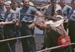 Image of US submarine crews and Japanese POWs disembarking Pearl Harbor Hawaii USA, 1944, second 36 stock footage video 65675076128