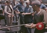 Image of US submarine crews and Japanese POWs disembarking Pearl Harbor Hawaii USA, 1944, second 37 stock footage video 65675076128