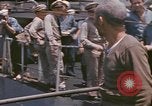 Image of US submarine crews and Japanese POWs disembarking Pearl Harbor Hawaii USA, 1944, second 38 stock footage video 65675076128