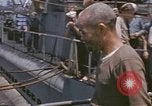Image of US submarine crews and Japanese POWs disembarking Pearl Harbor Hawaii USA, 1944, second 39 stock footage video 65675076128