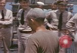 Image of US submarine crews and Japanese POWs disembarking Pearl Harbor Hawaii USA, 1944, second 41 stock footage video 65675076128