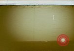 Image of Japanese submarine purposely destroyed after end of World War II Pacific Ocean, 1946, second 1 stock footage video 65675076135