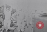 Image of Sailors do calisthenics aboard USS Nautilus SS-168 Pacific Ocean, 1942, second 42 stock footage video 65675076179