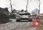Image of U.S. armor and troops pass through town near end of World War II Germany, 1945, second 9 stock footage video 65675076290