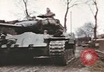 Image of U.S. armor and troops pass through town near end of World War II Germany, 1945, second 13 stock footage video 65675076290