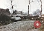 Image of U.S. armor and troops pass through town near end of World War II Germany, 1945, second 18 stock footage video 65675076290