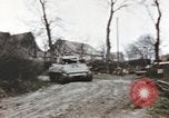 Image of U.S. armor and troops pass through town near end of World War II Germany, 1945, second 19 stock footage video 65675076290