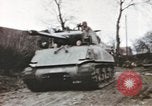 Image of U.S. armor and troops pass through town near end of World War II Germany, 1945, second 24 stock footage video 65675076290