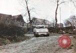 Image of U.S. armor and troops pass through town near end of World War II Germany, 1945, second 30 stock footage video 65675076290