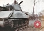 Image of U.S. armor and troops pass through town near end of World War II Germany, 1945, second 36 stock footage video 65675076290