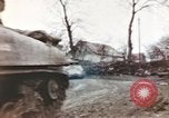 Image of U.S. armor and troops pass through town near end of World War II Germany, 1945, second 37 stock footage video 65675076290