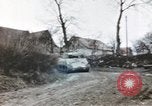 Image of U.S. armor and troops pass through town near end of World War II Germany, 1945, second 38 stock footage video 65675076290