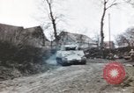 Image of U.S. armor and troops pass through town near end of World War II Germany, 1945, second 39 stock footage video 65675076290