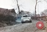 Image of U.S. armor and troops pass through town near end of World War II Germany, 1945, second 40 stock footage video 65675076290