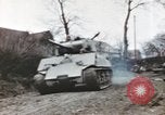 Image of U.S. armor and troops pass through town near end of World War II Germany, 1945, second 42 stock footage video 65675076290