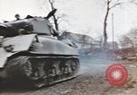 Image of U.S. armor and troops pass through town near end of World War II Germany, 1945, second 43 stock footage video 65675076290