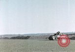 Image of U.S. armor and troops pass through town near end of World War II Germany, 1945, second 51 stock footage video 65675076290