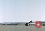 Image of U.S. armor and troops pass through town near end of World War II Germany, 1945, second 52 stock footage video 65675076290