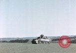 Image of U.S. armor and troops pass through town near end of World War II Germany, 1945, second 53 stock footage video 65675076290
