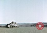 Image of U.S. armor and troops pass through town near end of World War II Germany, 1945, second 55 stock footage video 65675076290