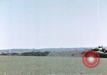 Image of U.S. armor and troops pass through town near end of World War II Germany, 1945, second 59 stock footage video 65675076290