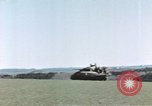 Image of U.S. armor and troops pass through town near end of World War II Germany, 1945, second 61 stock footage video 65675076290