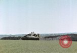 Image of U.S. armor and troops pass through town near end of World War II Germany, 1945, second 62 stock footage video 65675076290