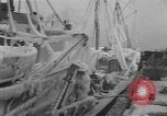 Image of American trawlers covered with ice Boston Massachusetts USA, 1954, second 5 stock footage video 65675076332