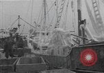 Image of American trawlers covered with ice Boston Massachusetts USA, 1954, second 19 stock footage video 65675076332