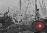 Image of American trawlers covered with ice Boston Massachusetts USA, 1954, second 20 stock footage video 65675076332