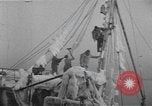 Image of American trawlers covered with ice Boston Massachusetts USA, 1954, second 31 stock footage video 65675076332