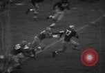 Standbild Fußballspiel South Bend Indiana USA, 1957, aus Sekunde 25 historischem Filmmaterial Videoclip 65675076343