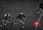 Standbild Fußballspiel South Bend Indiana USA, 1957, aus Sekunde 28 historischem Filmmaterial Videoclip 65675076343