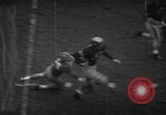 Standbild Fußballspiel South Bend Indiana USA, 1957, aus Sekunde 29 historischem Filmmaterial Videoclip 65675076343