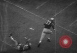 Standbild Fußballspiel South Bend Indiana USA, 1957, aus Sekunde 35 historischem Filmmaterial Videoclip 65675076343