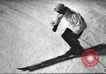 Image of skiing United States USA, 1941, second 35 stock footage video 65675076390