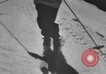 Image of skiing United States USA, 1941, second 30 stock footage video 65675076391