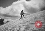 Image of skiing United States USA, 1941, second 47 stock footage video 65675076392