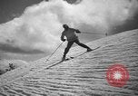 Image of skiing United States USA, 1941, second 60 stock footage video 65675076392