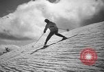 Image of skiing United States USA, 1941, second 62 stock footage video 65675076392