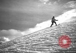 Image of skiing United States USA, 1941, second 8 stock footage video 65675076393