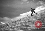 Image of skiing United States USA, 1941, second 10 stock footage video 65675076393