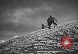 Image of skiing United States USA, 1941, second 25 stock footage video 65675076393