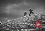 Image of skiing United States USA, 1941, second 30 stock footage video 65675076393